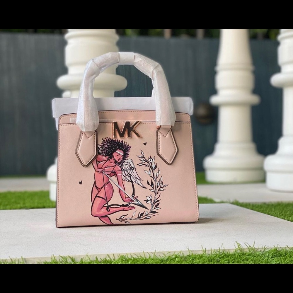 Pink Michael Kors Purse with custom painting on front.